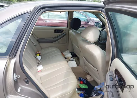 1999 Toyota Avalon Xls z USA, uszkodzony, nr VIN 4T1BF18B2XU333348